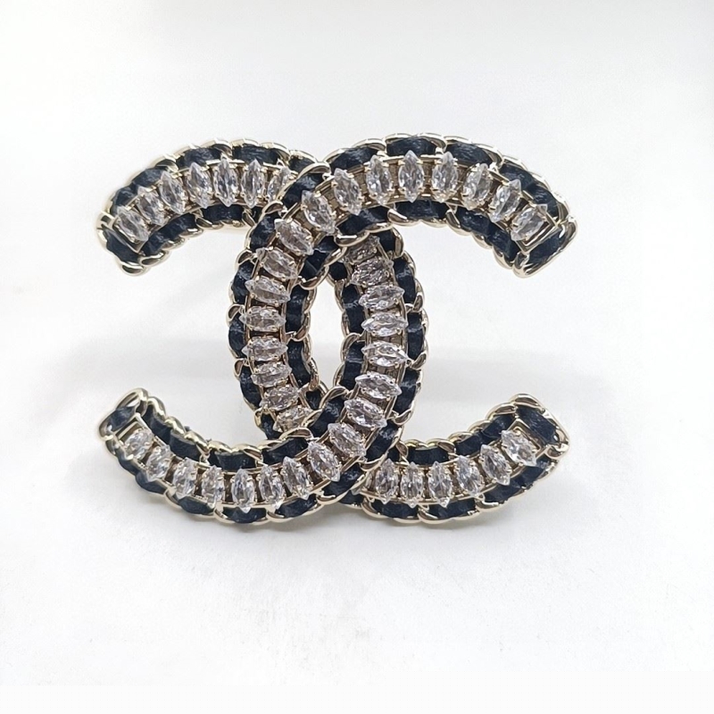 Ch*el brooches
